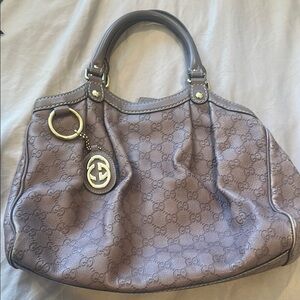 Gucci Brown Shoulder Bag with Luxurious Leather Handles